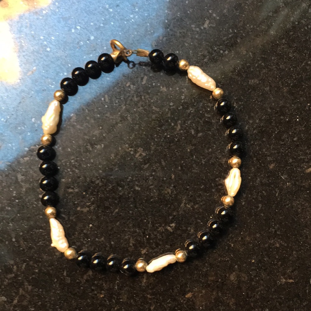 Black and gold and freshwater pearl bracelet